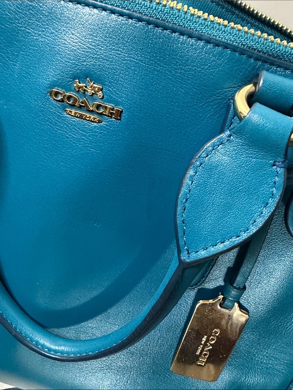 Coach Crosby Carryall Handbag in a vibrant teal/blue leather finish.